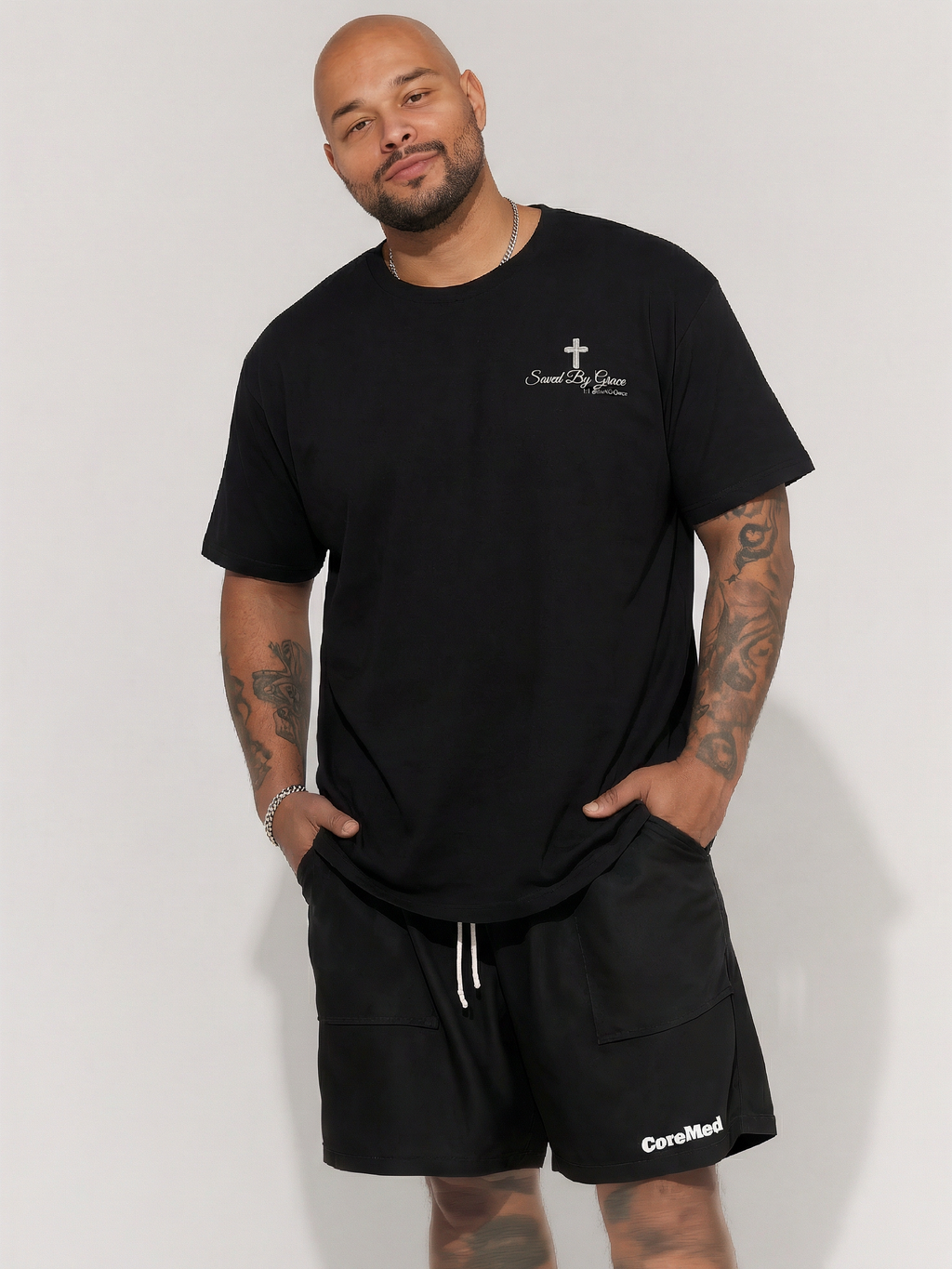 The "Saved By Grace" Essential Chest Logo Tee Men's